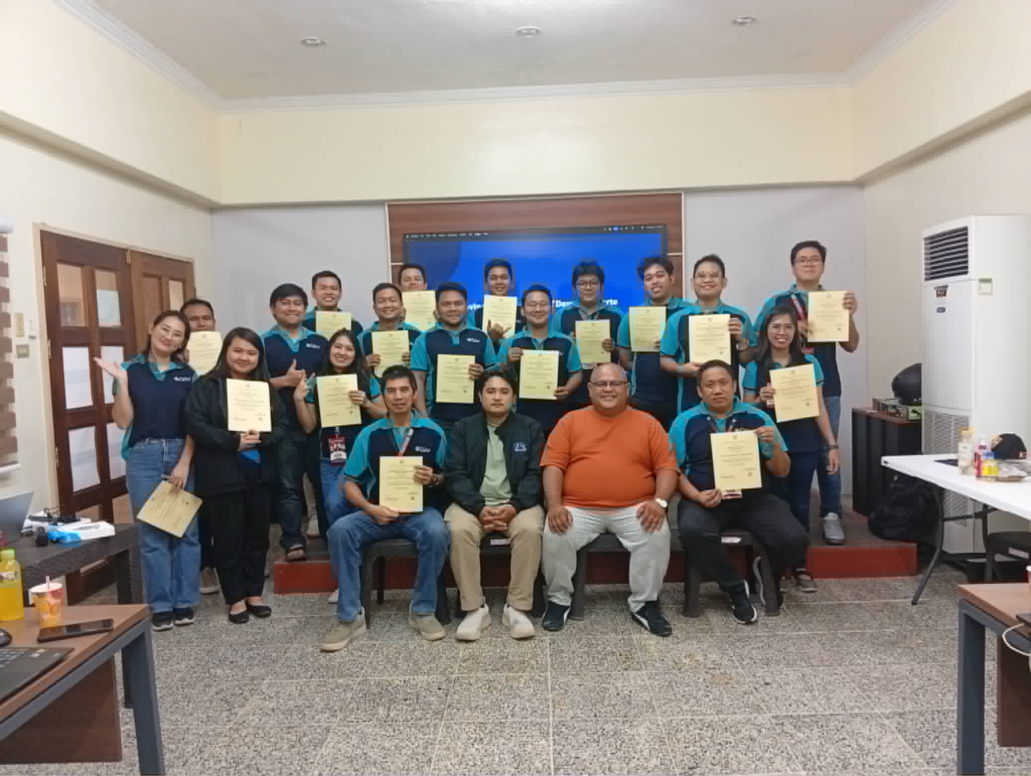 IT and CERT teams of the Provincial Government of Davao del Norte holding their certificates after the 3-day cybersecurity technical training